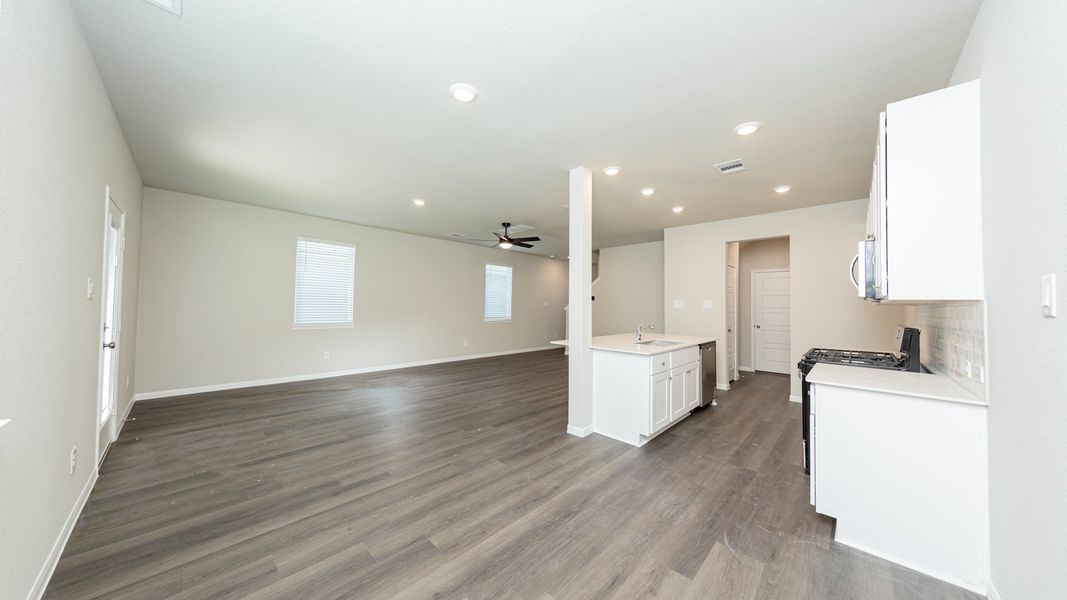Dining Area to Kitchen and Family Room Dining Area to Kitchen and Family Room