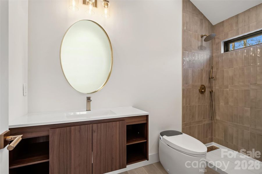 2nd Primary En suite bath with a floating vanity