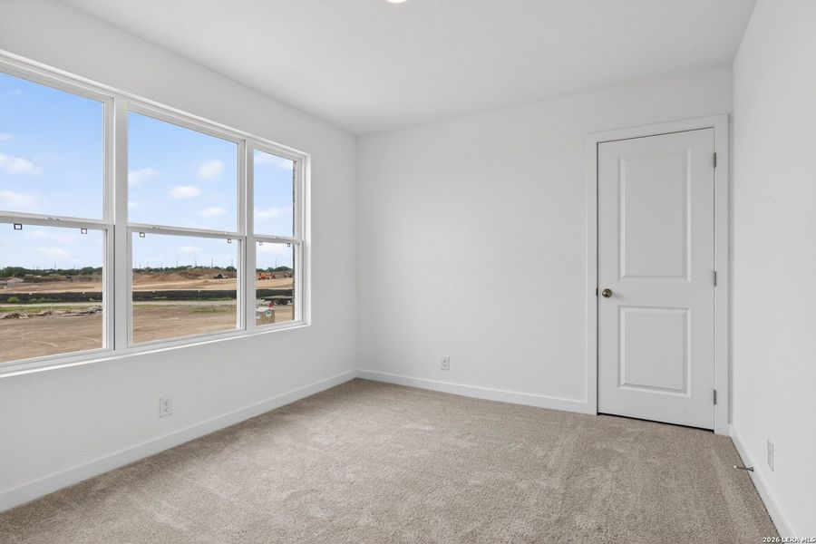 Spacious, unfurnished interior of a new home in The Wilder, Adkins (Image 24).