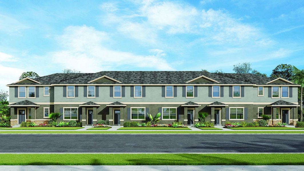 Front exterior of a new home in Waterleigh, Winter Garden, FL, highlighting curb appeal (Image 2). Front exterior of a new home in Waterleigh, Winter Garden, FL, highlighting curb appeal (Image 2).