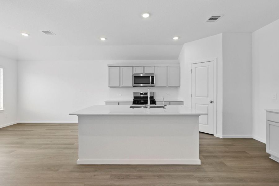 Furnished interior view inside a new home in The Canopies, Splendora (Image 8).