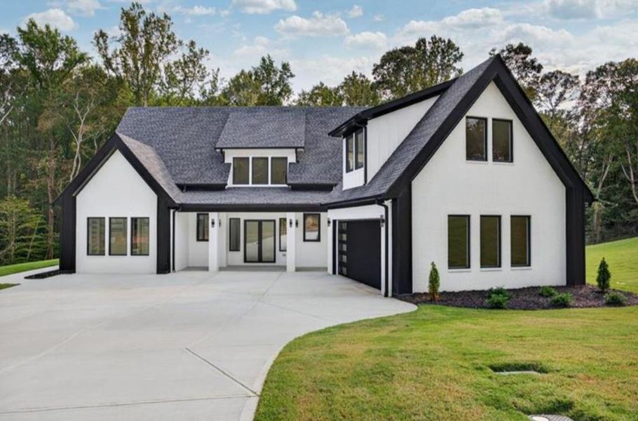 Front exterior of a new home in , Auburn, GA, highlighting curb appeal (Image 2). Front exterior of a new home in , Auburn, GA, highlighting curb appeal (Image 2).