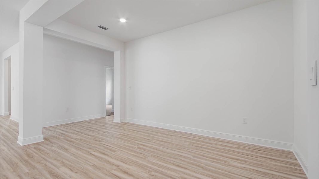 Representative unfurnished interior of a home built from the Kennedy by D.R. Horton in Bayside at Ward Creek, Panama City Beach (Image 20).