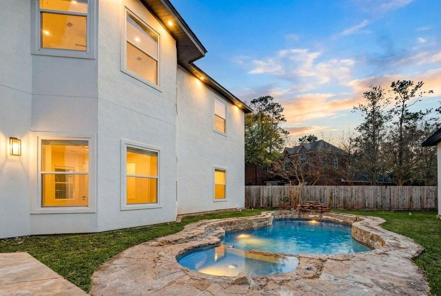 Exterior details and patio area of a home in , Spring (Image 11).