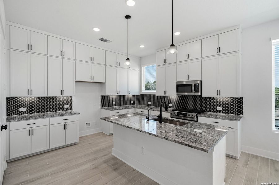 Furnished interior view inside a new home in Rose Hill, San Antonio (Image 14).