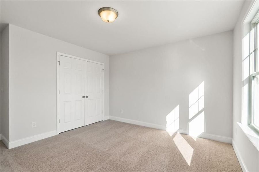 Spacious, unfurnished interior of a new home in Wehunt Meadows, Hoschton (Image 112).