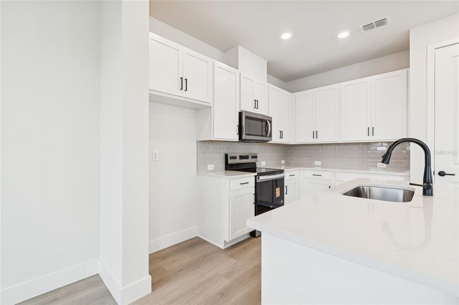 Furnished interior view inside a new home in North River Ranch – Townhomes, Parrish (Image 13).