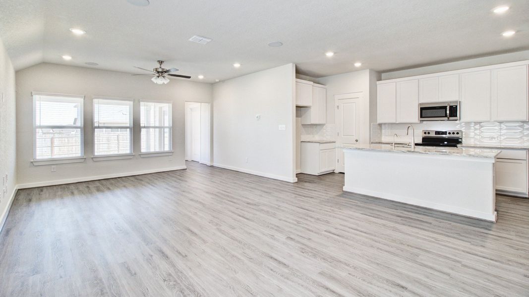 Representative furnished interior of a home built from the Paramount by Brightland Homes in Cielo, Conroe (Image 7).