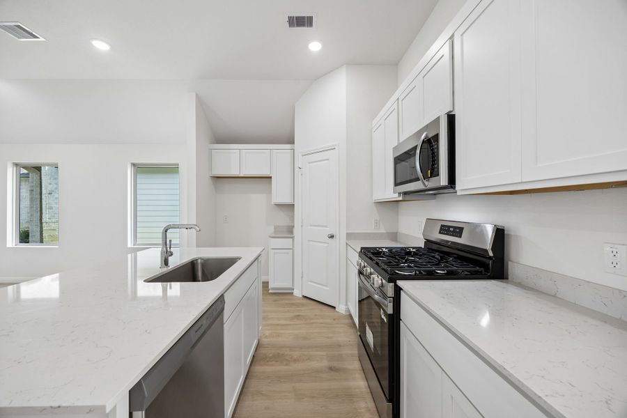 Furnished interior view inside a new home in Riviera Pines, Huffman (Image 9).