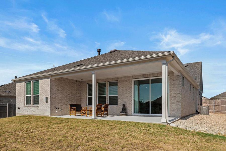 The back patio is large and features a gas line for a grill.