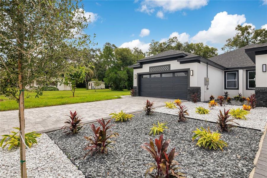 Front exterior of a new home in , Apopka, FL, highlighting curb appeal (Image 40).