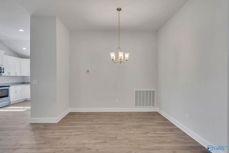 Representative unfurnished interior of a home built from the 2200 by Adams Homes in Winding Oaks, Weeki Wachee (Image 27). Representative unfurnished interior of a home built from the 2200 by Adams Homes in Winding Oaks, Weeki Wachee (Image 27).