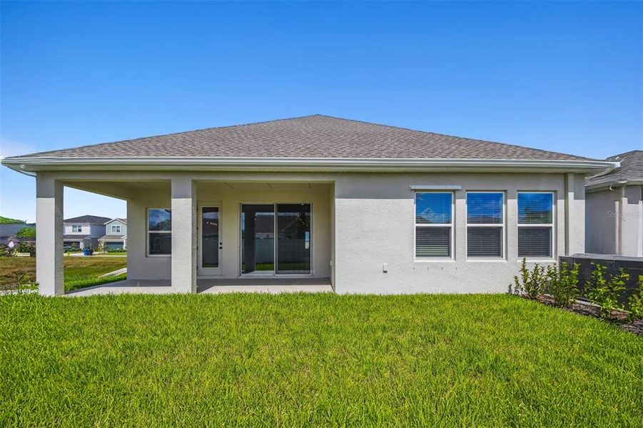 Exterior details and patio area of a home in The Peninsula at Rhodine Lake, Riverview (Image 25). Exterior details and patio area of a home in The Peninsula at Rhodine Lake, Riverview (Image 25).