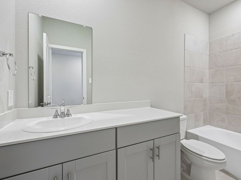 Furnished interior view inside a new home in Cibolo Hills West - Spring Series, Fort Worth (Image 11). Furnished interior view inside a new home in Cibolo Hills West - Spring Series, Fort Worth (Image 11).