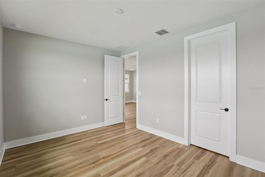 Spacious, unfurnished interior of a new home in Lagoon Residences at Epperson, Wesley Chapel (Image 44).