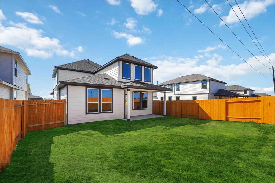 Exterior details and patio area of a home in Tejas Village, Beasley (Image 16).