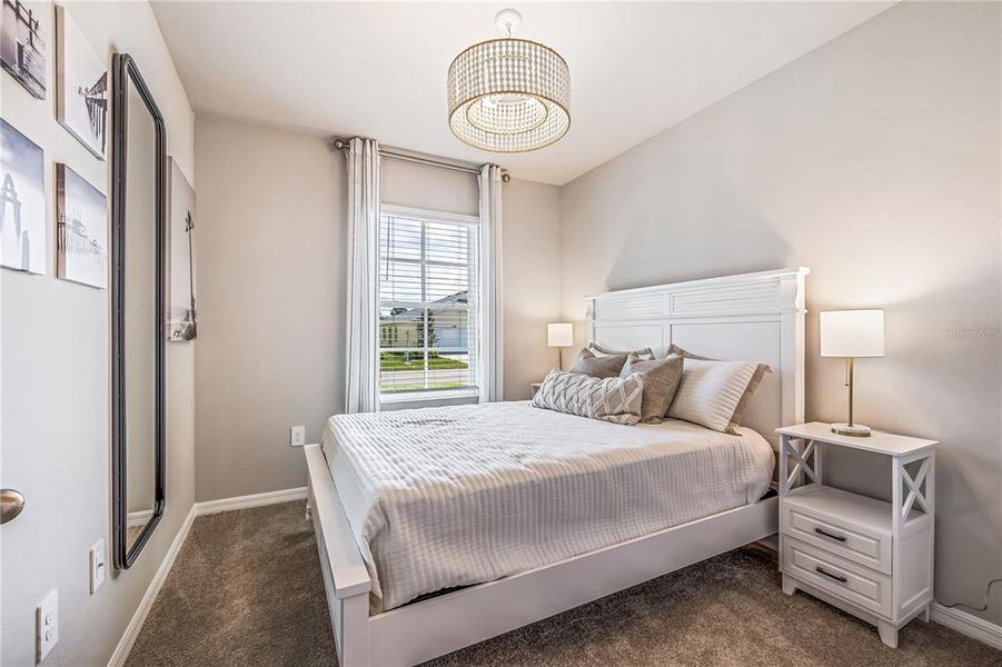 Furnished interior view inside a new home in Heritage Lake Park, Punta Gorda (Image 11).