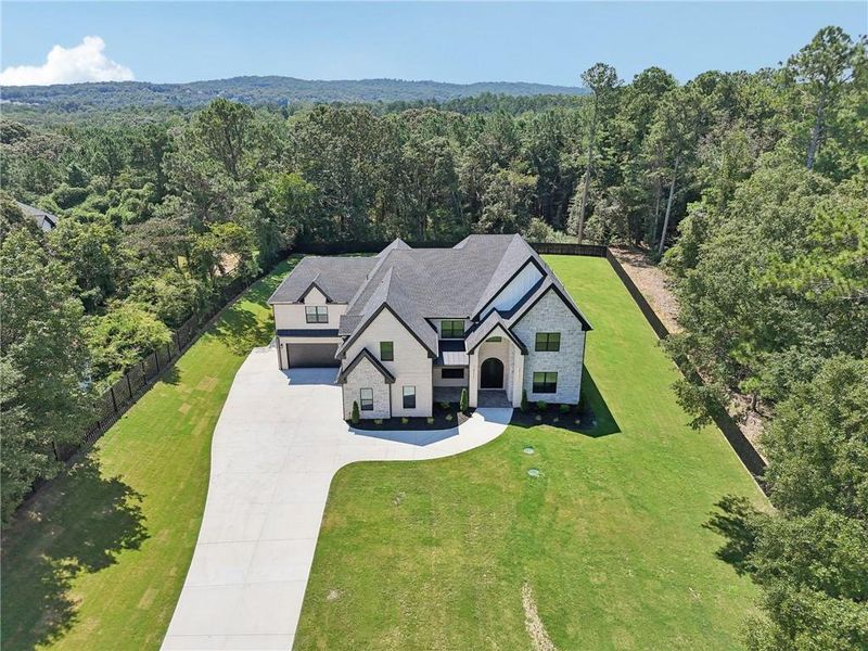Front exterior of a new home in , Hoschton, GA, highlighting curb appeal (Image 31). Front exterior of a new home in , Hoschton, GA, highlighting curb appeal (Image 31).