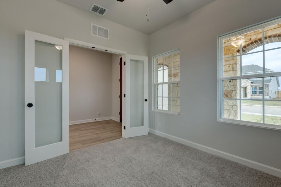 Representative unfurnished interior of a home built from the Jordan by Ashton Woods in Hennersby Hollow, San Antonio (Image 19).
