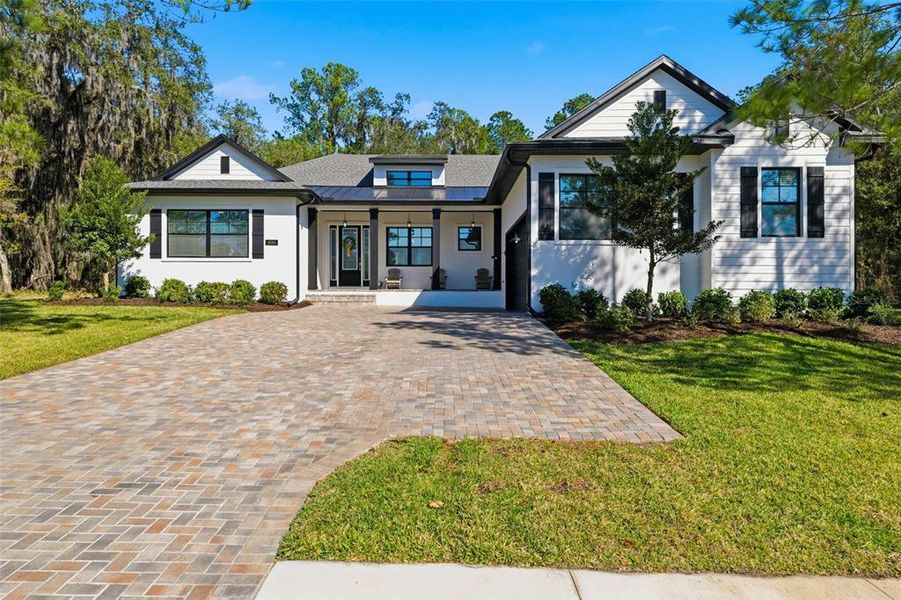 Front exterior of a new home in , Brooksville, FL, highlighting curb appeal (Image 25). Front exterior of a new home in , Brooksville, FL, highlighting curb appeal (Image 25).