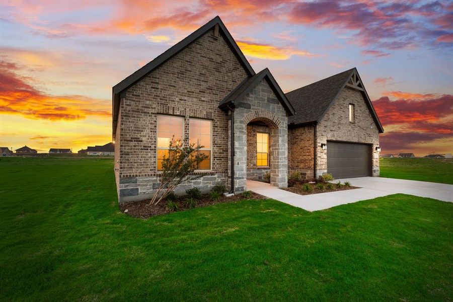 Front exterior of a new home in Fairview Meadows, New Fairview, TX, highlighting curb appeal (Image 2). Front exterior of a new home in Fairview Meadows, New Fairview, TX, highlighting curb appeal (Image 2).