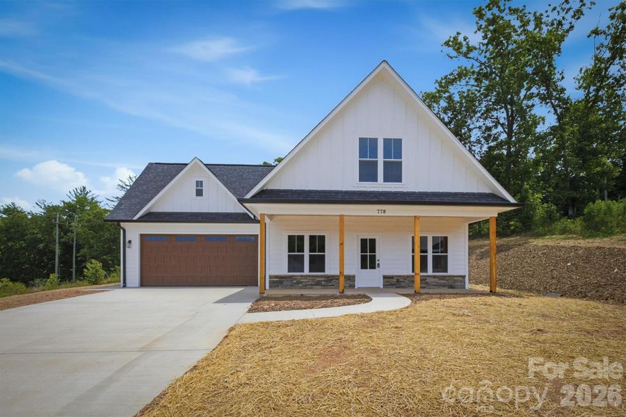 Front exterior of a new home in , Valdese, NC, highlighting curb appeal (Image 2). Front exterior of a new home in , Valdese, NC, highlighting curb appeal (Image 2).