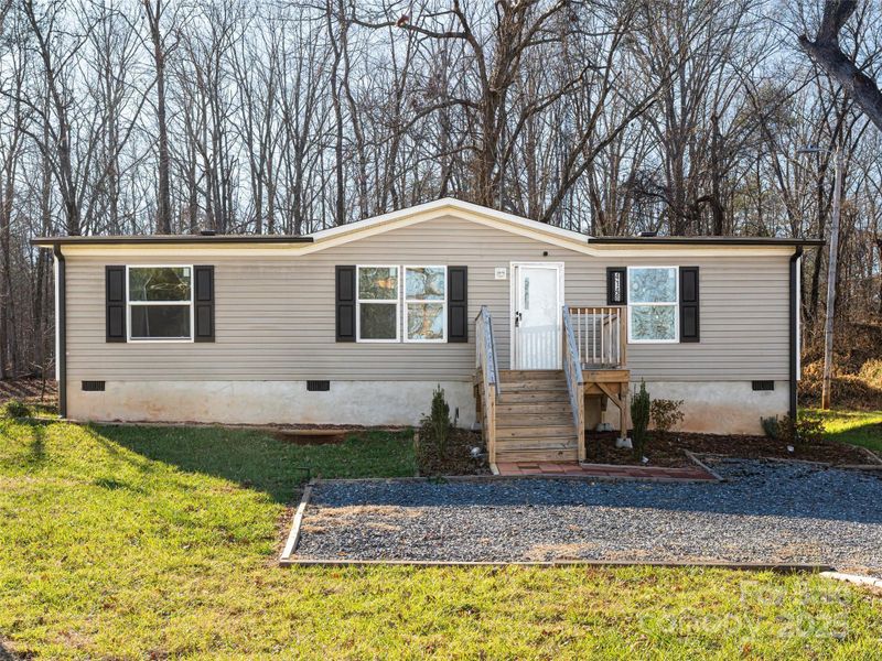 Exterior details and patio area of a home in , Morganton (Image 24).
