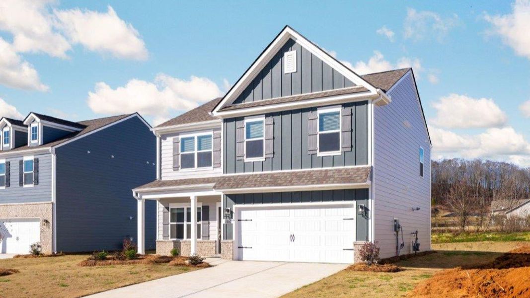 Front exterior of a new home in Prairie Pass, Apison, TN, highlighting curb appeal (Image 16). Front exterior of a new home in Prairie Pass, Apison, TN, highlighting curb appeal (Image 16).