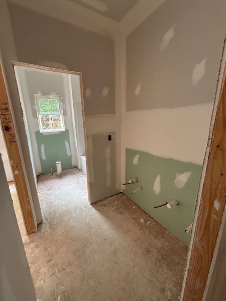 In-progress construction of a new home in White Oaks, The Rock, GA (Image 5).