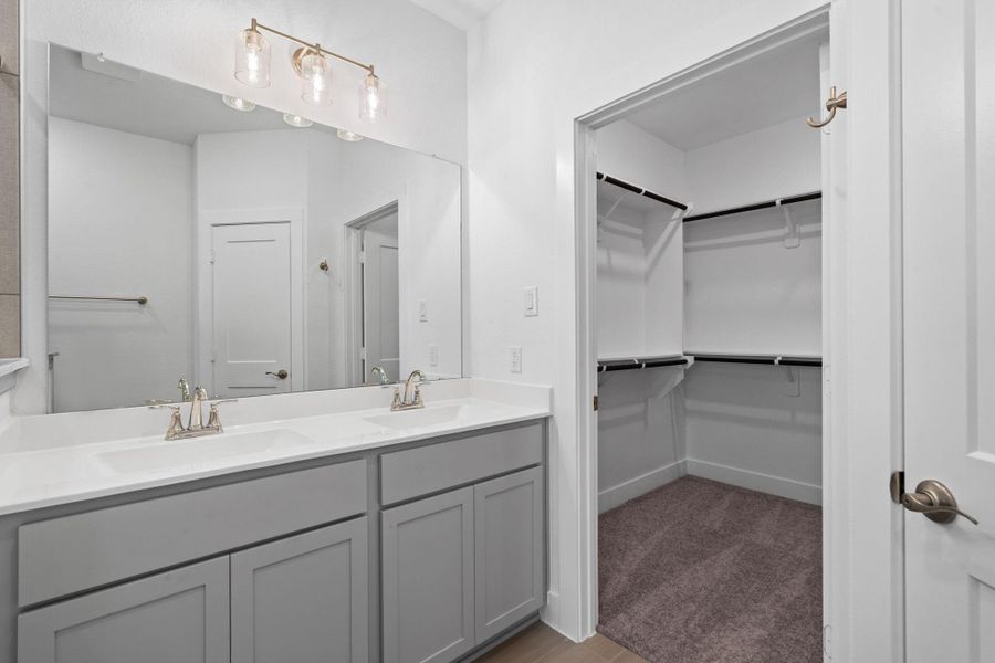 Furnished interior view inside a new home in Meridiana, Iowa Colony (Image 6).