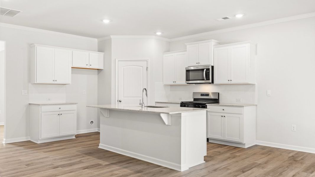 Representative furnished interior of a home built from the Hayden by D.R. Horton in Liberty Crossing, Braselton (Image 7).