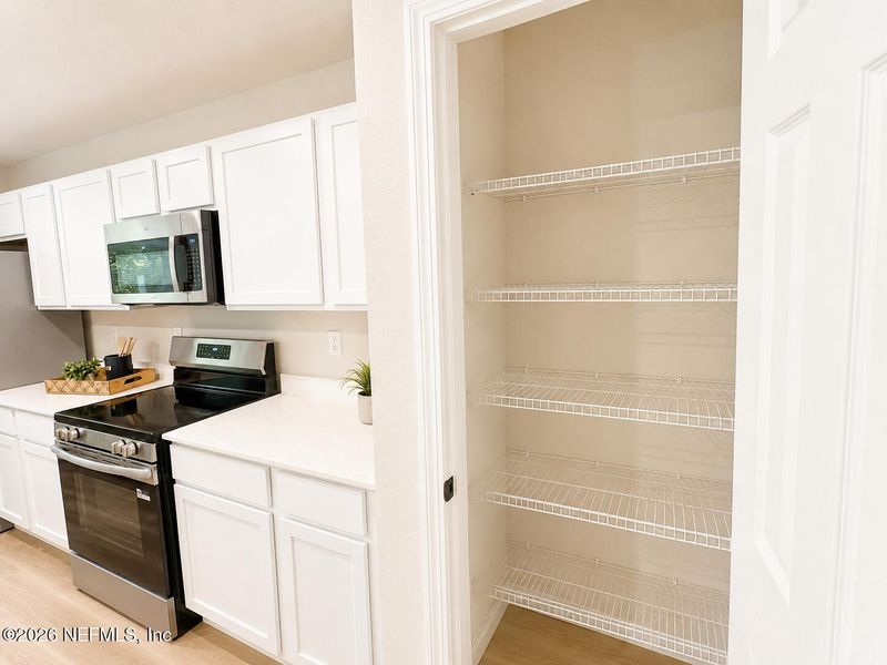 Furnished interior view inside a new home in , Jacksonville (Image 9).
