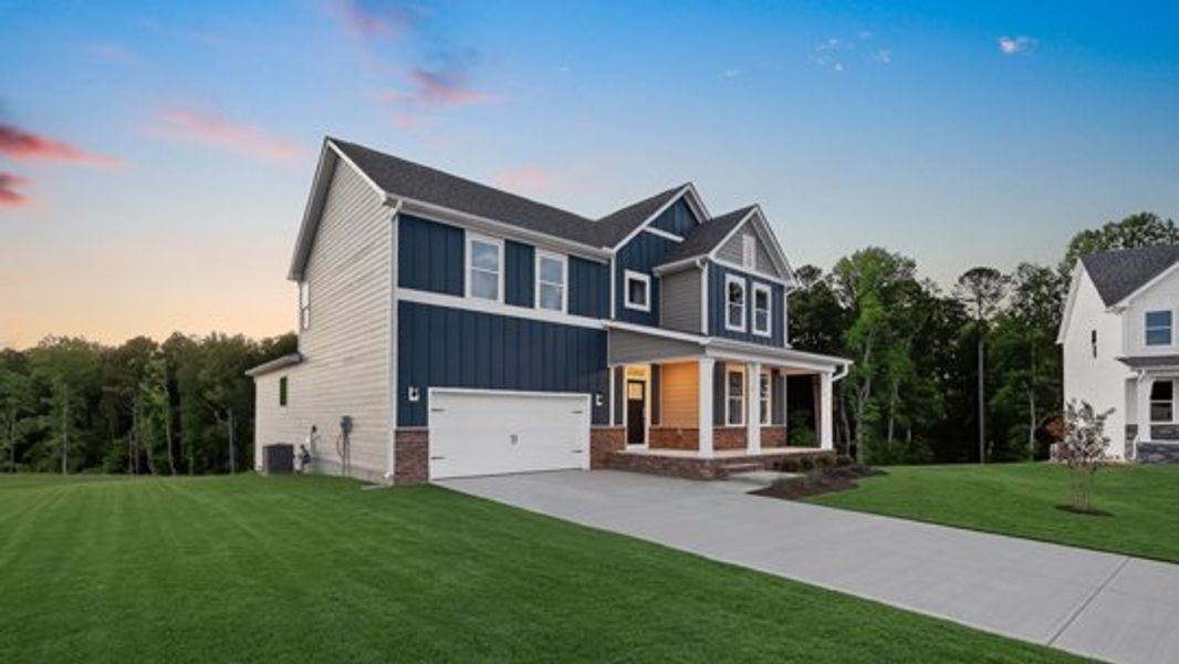 Representative exterior photo of a completed home built from the Hartwell by D.R. Horton in Kalas Falls, Wake Forest, NC (Image 19).