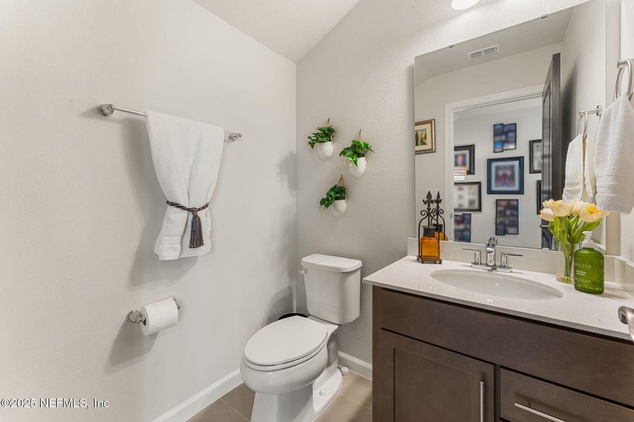 Furnished interior view inside a new home in Seminole Palms Single-Family Homes, Palm Coast (Image 62).