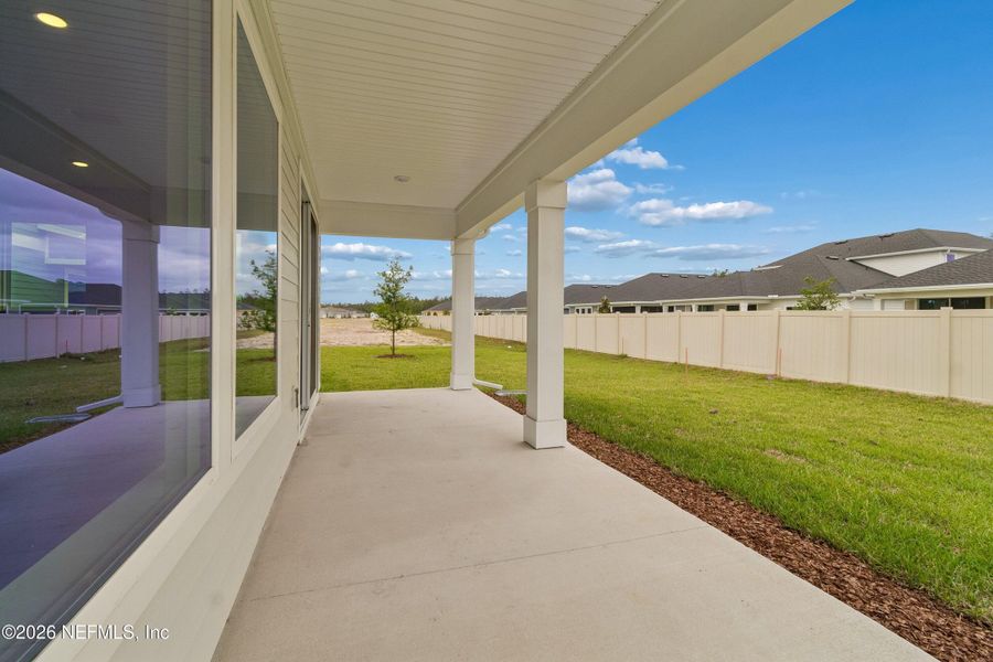Exterior details and patio area of a home in Tributary 50', Yulee (Image 3).