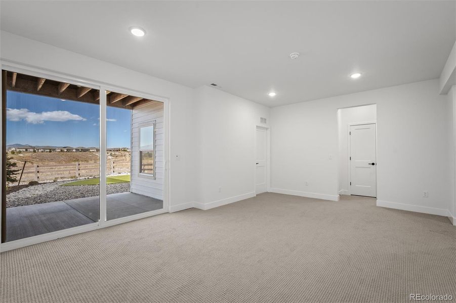 Spacious, unfurnished interior of a new home in Revel Crossing at Wolf Ranch - The Panorama Collection, Colorado Springs (Image 22).