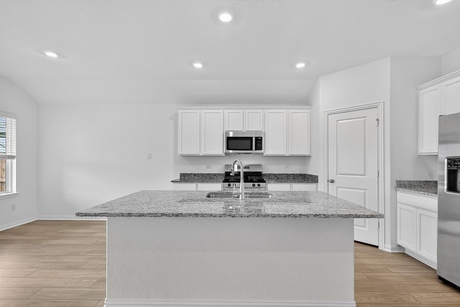 Furnished interior view inside a new home in River Ridge, Crandall (Image 4).