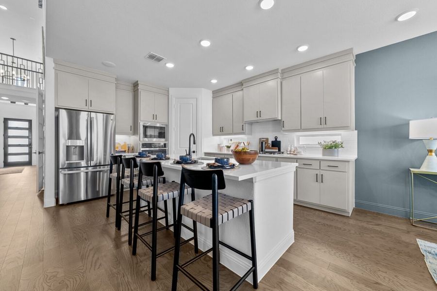 Representative furnished interior of a home built from the Rainer by Landon Homes in Lexington Frisco, Frisco (Image 13).