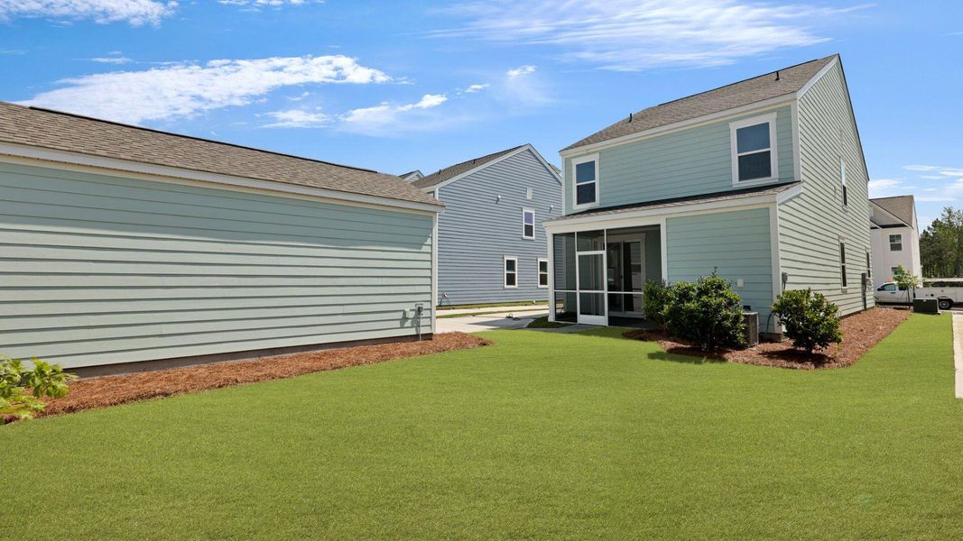 Front exterior of a new home in Sheep Island, Summerville, SC, highlighting curb appeal (Image 2).