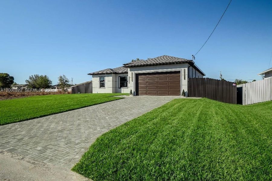 Exterior details and patio area of a home in , Lehigh Acres (Image 2). Exterior details and patio area of a home in , Lehigh Acres (Image 2).