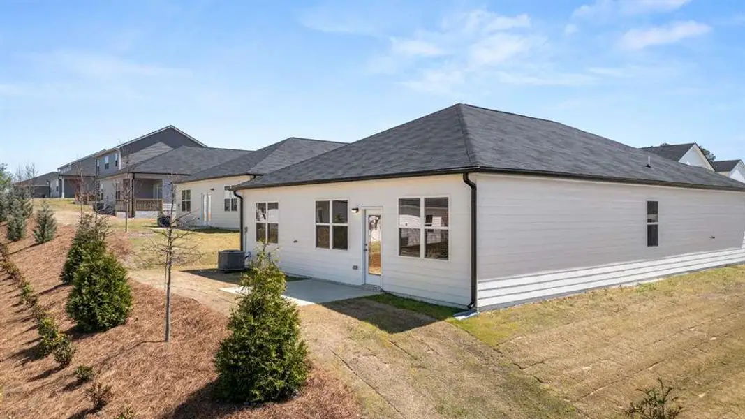 Exterior details and patio area of a home in Champion's Run, Lithonia (Image 3).