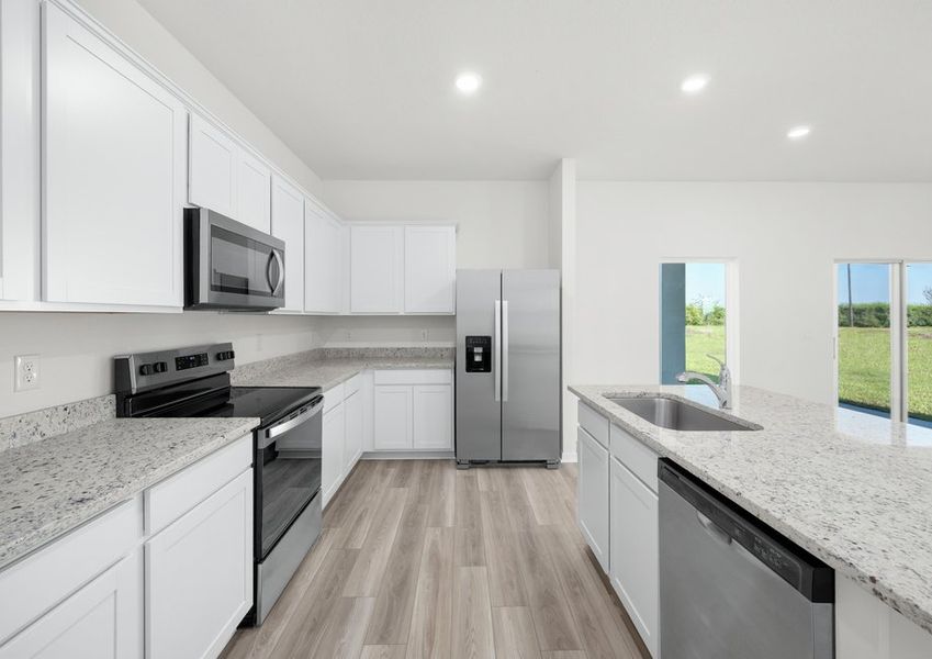 This chef-ready kitchen comes with stainless steel appliances