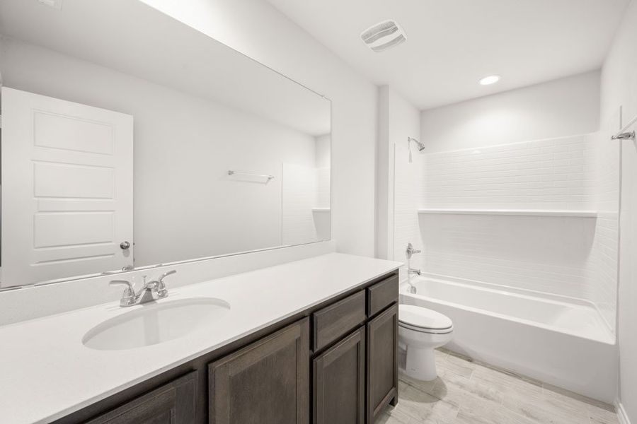 Front exterior of a new home in Stone Eagle, Azle, TX, highlighting curb appeal (Image 15). Front exterior of a new home in Stone Eagle, Azle, TX, highlighting curb appeal (Image 15).