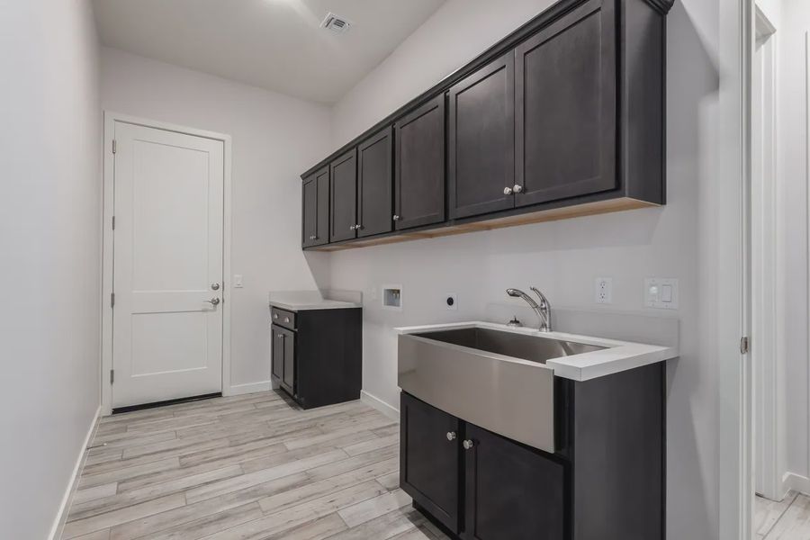 Furnished interior view inside a new home in Valencia at Granite Vista, Waddell (Image 14).