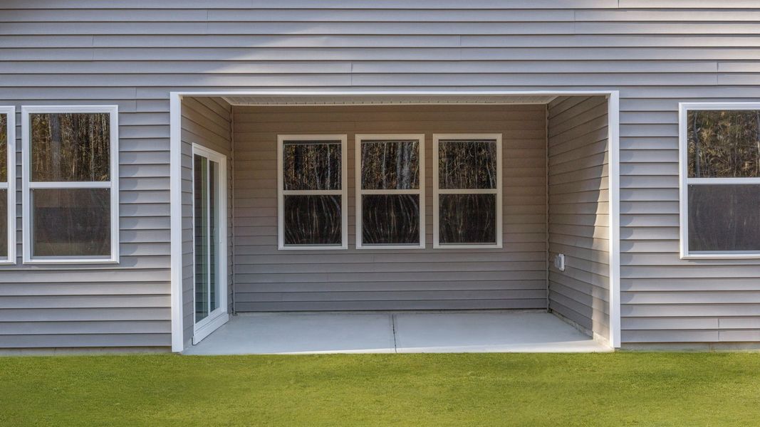 Exterior details and patio area of a home in West New Bern, New Bern (Image 4).
