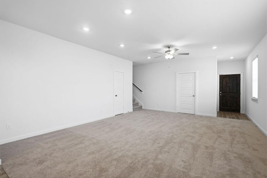 Spacious, unfurnished interior of a new home in , Iowa Colony (Image 22).