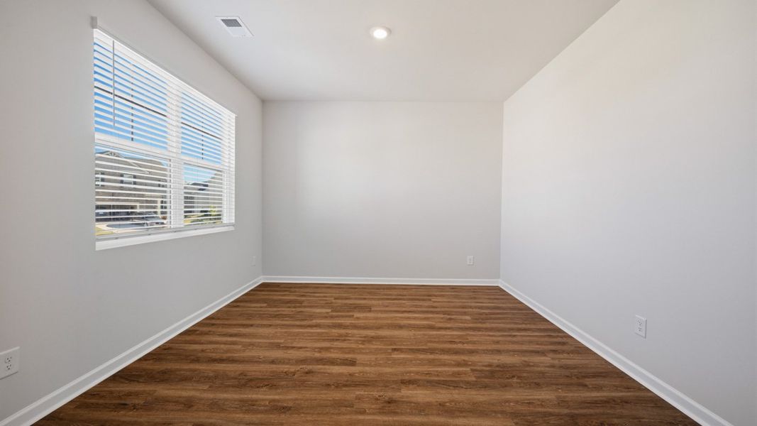 Spacious, unfurnished interior of a new home in The Reserve at Calcutta, Stockbridge (Image 16).