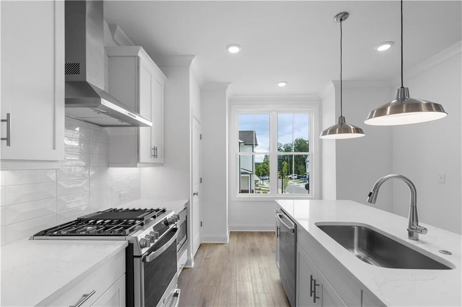 soft close kitchen doors and drawers - *Pictures represent a previously built home, not the actual home, home is under construction*