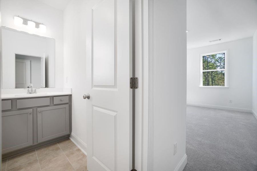 Furnished interior view inside a new home in Bailey Fence, Dacula (Image 11).
