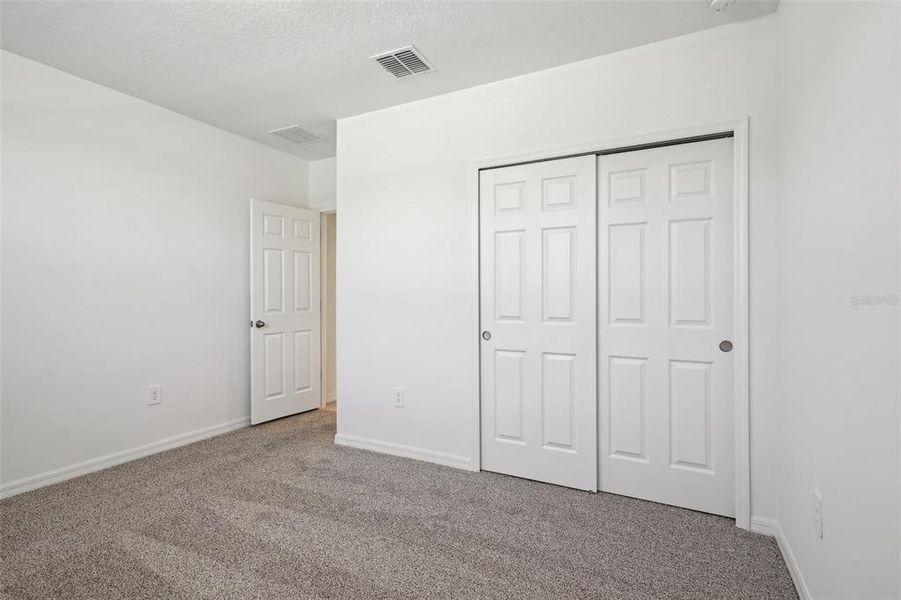 Spacious, unfurnished interior of a new home in Lake Deer Estates - Signature Series, Poinciana (Image 38). Spacious, unfurnished interior of a new home in Lake Deer Estates - Signature Series, Poinciana (Image 38).